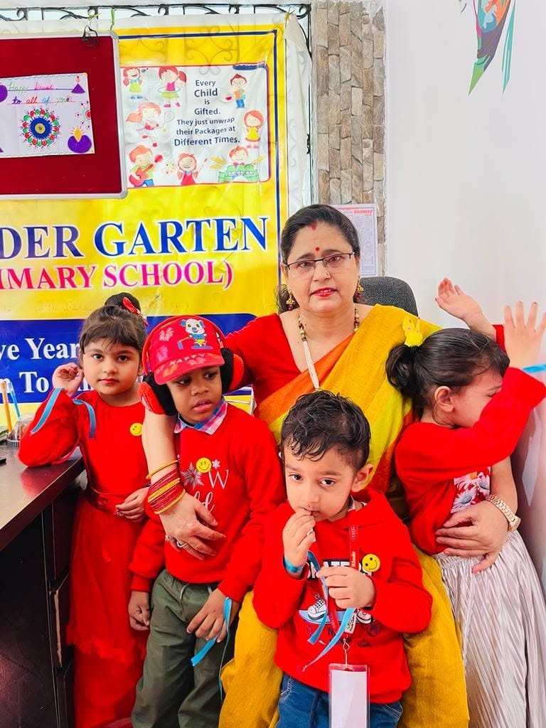 Children learning with teacher at Elina Kindergarten